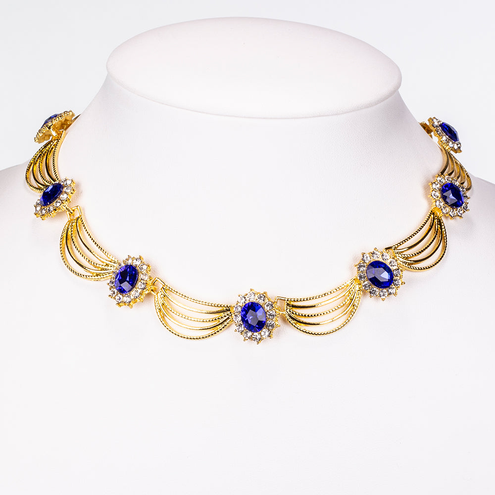 Set din Aliaj Placat cu Aur ( 60 grame ) cu Cristal Albastru Emporia® și Cristal Alb Emporia® ( Colier+Cercei )