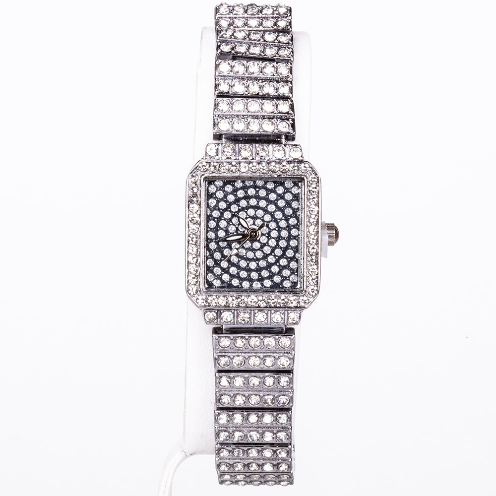 Set premium Emporia, compus din 5 piese în tonuri argintii, prezentat într-o cutie cadou exclusivă cu aspect de piele (ceas, brățară, colier, cercei și inel, decorate cu cristal alb Emporia). 9 