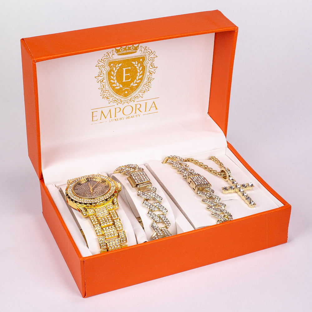 Set de bijuterii Emporia premium, format din 4 piese în nuanță aurie, prezentat într-o cutie cadou exclusivă cu efect de piele (include ceas, brățară, colier gros și colier cu pandantiv cruce, cu cristal alb Emporia). 1 