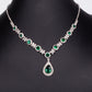Set din Aliaj Placat cu Aur ( 30 grame ) cu Cristal Verde Emporia® și Cristal Alb Emporia® ( Colier+Cercei+Brățară+Inel )