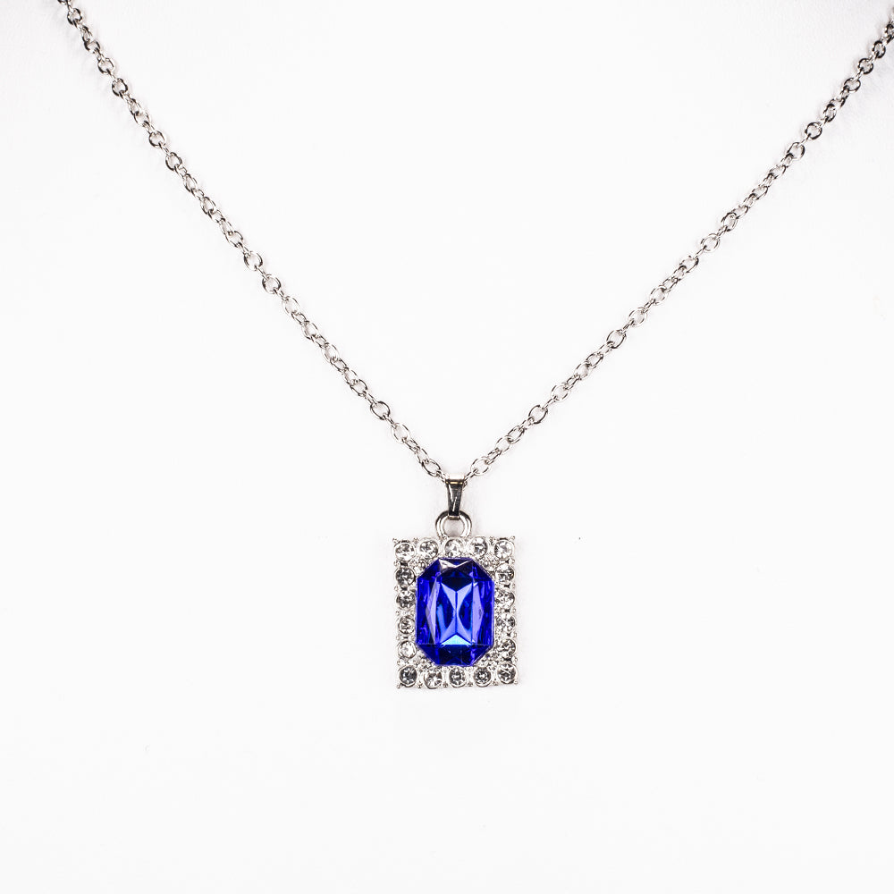 Ceas din Aliaj Placat cu Aur ( 57 grame ) cu Cristal Albastru Emporia® și Cristal Alb Emporia® 12 Carate ( Colier+Cercei+Pandantiv )